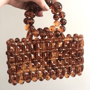 Cult Gaia - Cora Clutch in Tortoise Shell Acrylic